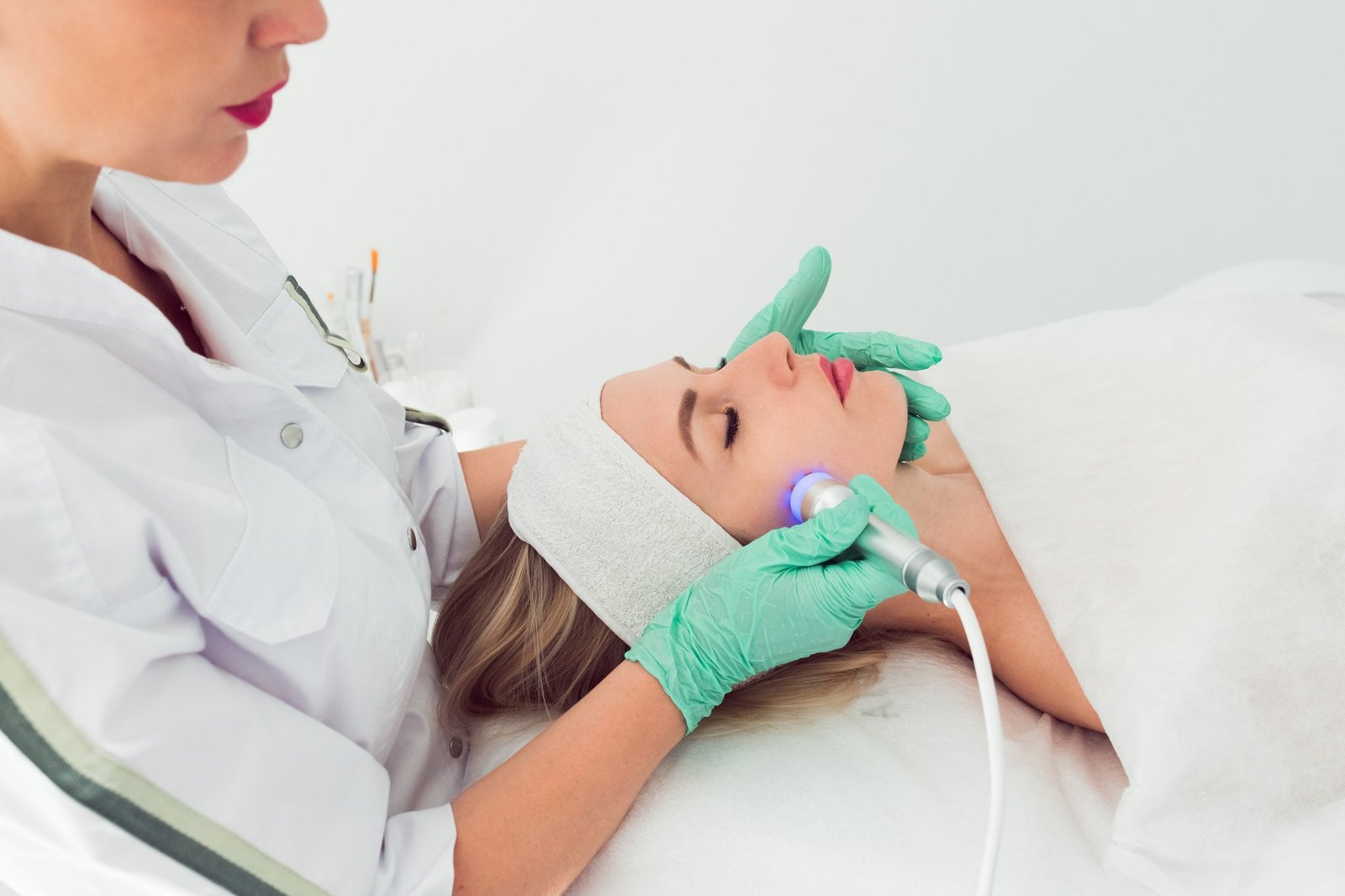 Radio frequency skin tightening, young woman in cosmetology clinic